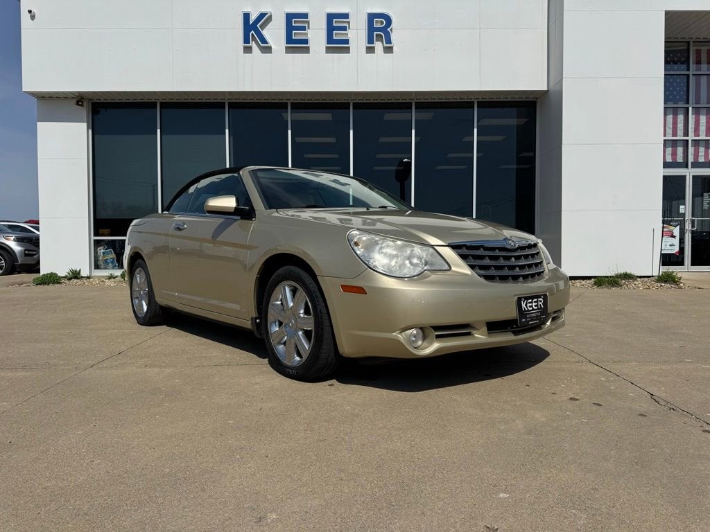 2010 Chrysler Sebring Limited in White Gold Clearcoat — front three-quarter view
