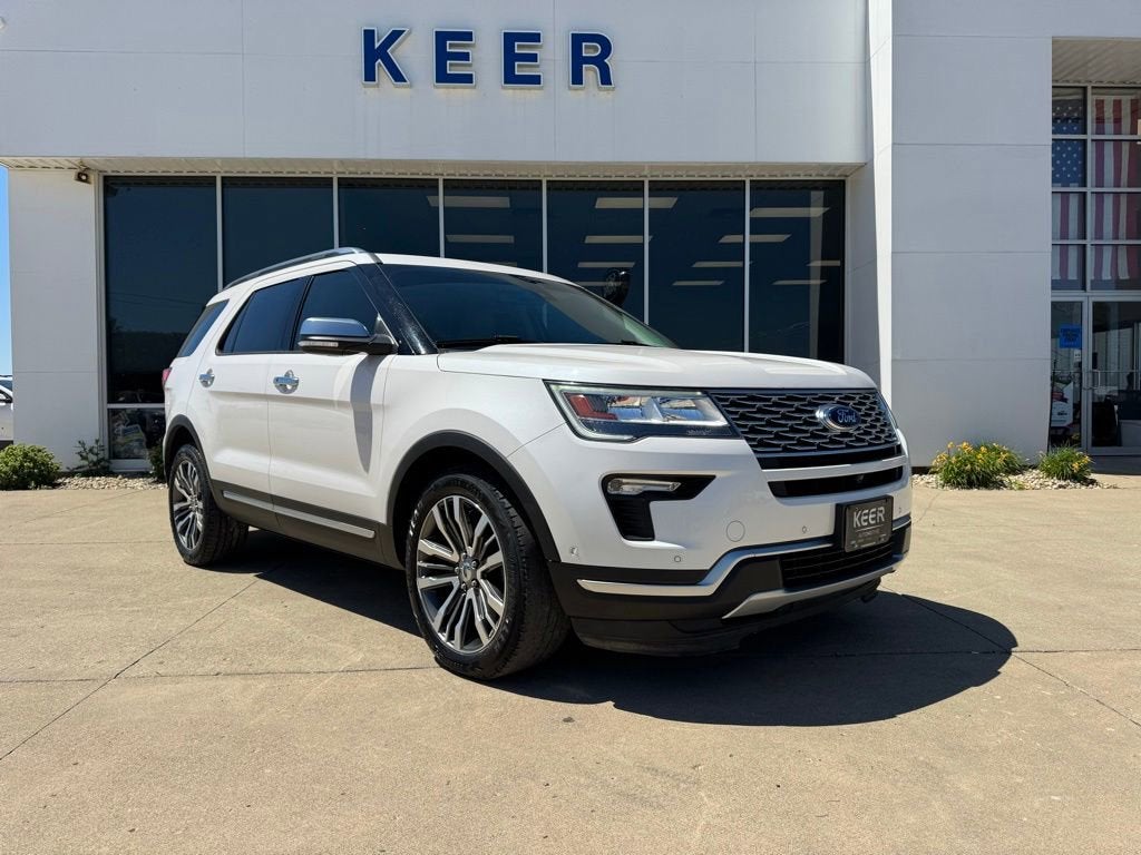 2019 Ford Explorer Platinum in White Platinum Clearcoat Metallic — front three-quarter view