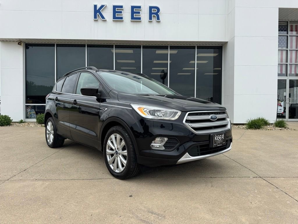 2019 Ford Escape SEL in Black Metallic — front three-quarter view