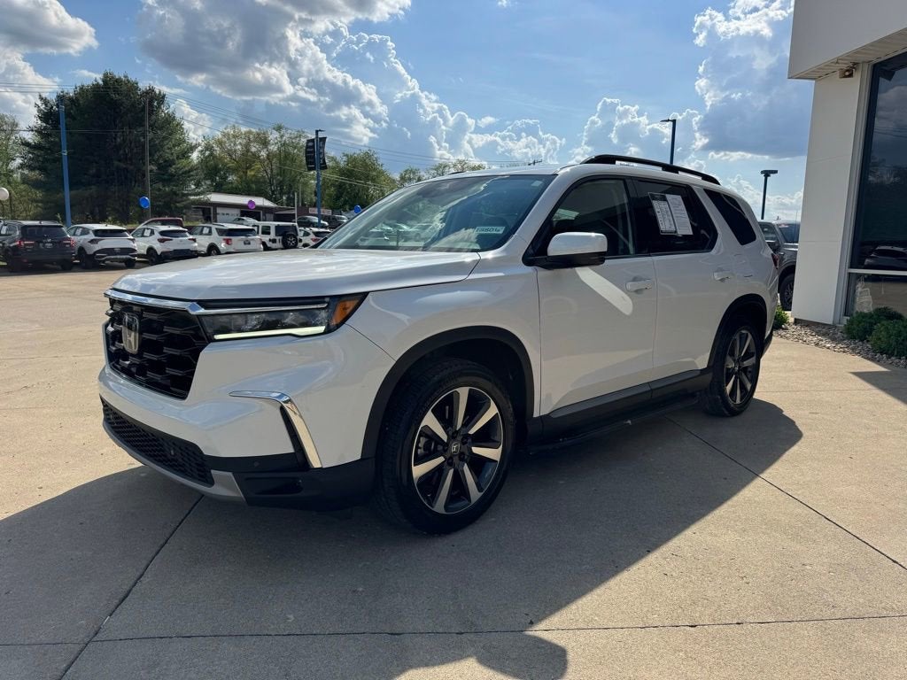 2025 Honda Pilot — rear three-quarter view