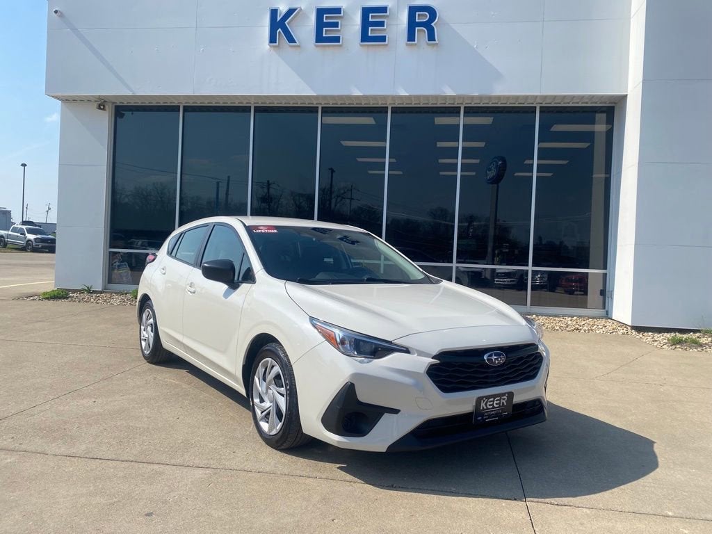 2024 Subaru Impreza Base in Crystal White Pearl — front three-quarter view
