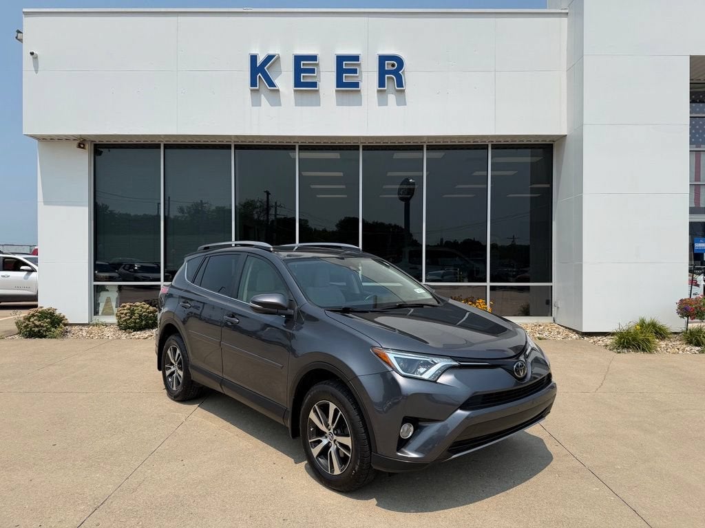 2017 Toyota RAV4 XLE in Magnetic Gray Metallic — front three-quarter view